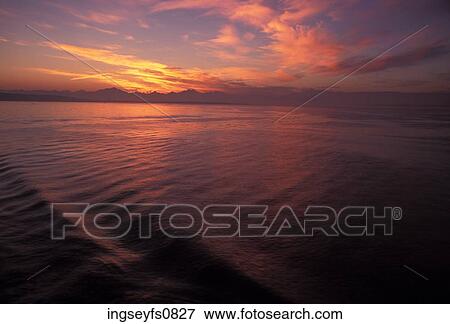 Calm Ocean at Sunset View Large Photo Image Stock Photo - Calm Ocean at Sunset. Fotosearch