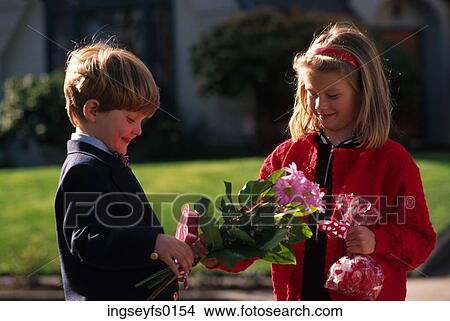 Chlidren with Flowers View Large Photo Image Picture - Chlidren with Flowers. Fotosearch