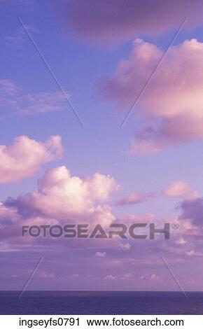 Clouds in a Sunny Sky View Large Photo Image Stock Image - Clouds in a Sunny Sky. Fotosearch