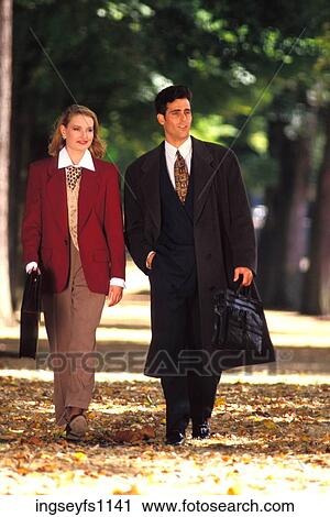 Corporate Couple Walking in Park View Large Photo Image Stock Image - Corporate Couple Walking in Park. Fotosearch
