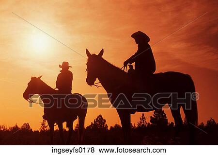 Cowboys at Sunset View Large Photo Image Stock Photo - Cowboys at Sunset. Fotosearch