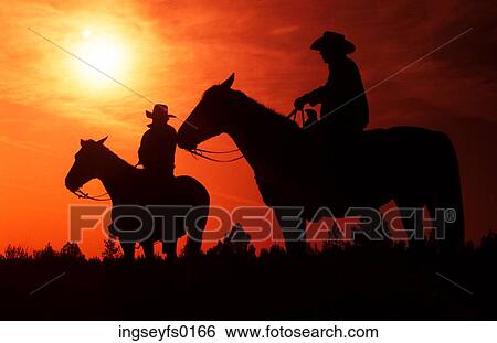 Cowboys at Sunset View Large Photo Image Stock Photograph - Cowboys at Sunset. Fotosearch
