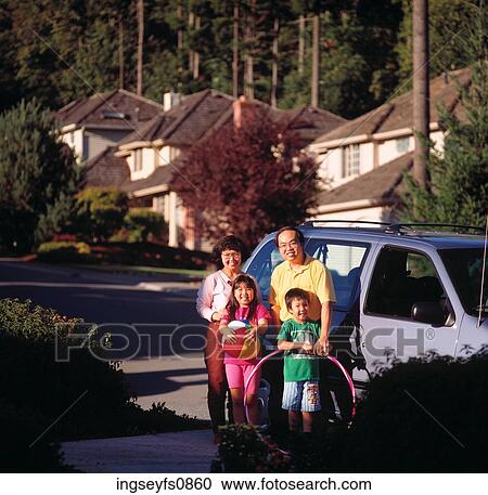 Family Standing by Minivan View Large Photo Image Stock Image - Family Standing by Minivan. Fotosearch