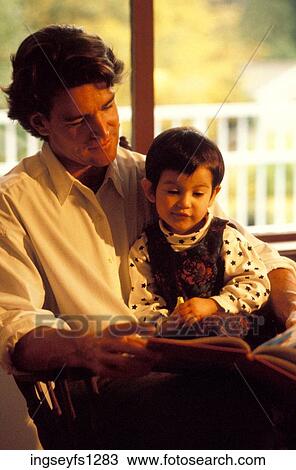 Father and Child Reading Together View Large Photo Image Stock Image - Father and Child Reading Together. Fotosearch