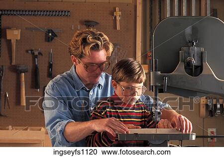 Father and Son in Wood Shop View Large Photo Image Stock Image - Father and Son in Wood Shop. Fotosearch