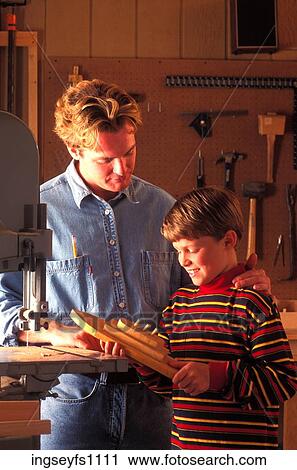 Father and Son Making Toy in Shop View Large Photo Image Stock Image - Father and Son Making Toy in Shop. Fotosearch