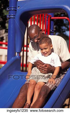 Father and Son Playing in Playground View Large Photo Image Stock Photography - Father and Son Playing in Playground. Fotosearch