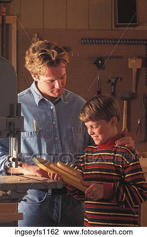 Father and Son Working in Woodshop View Large Photo Image Stock Image - Father and Son Working in Woodshop. Fotosearch