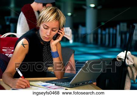 Stock Photo - Female Executives at Airport. Fotosearch