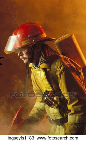 Firefighter at Work View Large Photo Image Stock Image - Firefighter at Work. Fotosearch