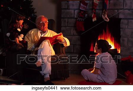 Grandfather Reading to Grandchildren View Large Photo Image Stock Image - Grandfather Reading to Grandchildren. Fotosearch