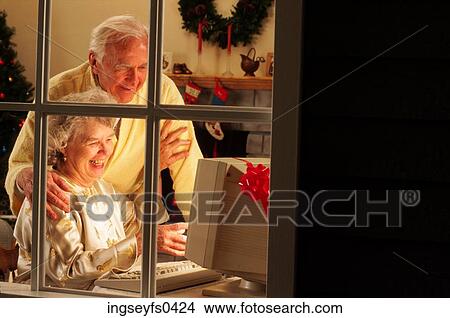 Grandparents on a New Computer View Large Photo Image Picture - Grandparents on a New Computer. Fotosearch