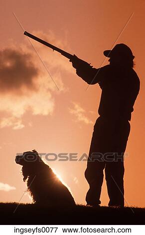 Hunter With His Dog View Large Photo Image Stock Photo - Hunter With His Dog. Fotosearch