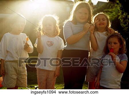 Kids Eating Popsicles View Large Photo Image Picture - Kids Eating Popsicles. Fotosearch