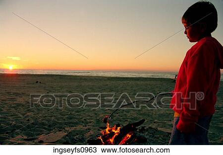 Little Boy at Beach Bonfire View Large Photo Image Stock Image - Little Boy at Beach Bonfire. Fotosearch