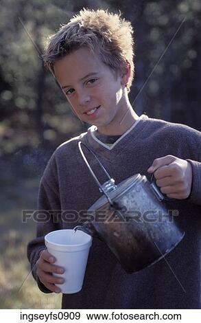 Stock Photo - Little Boy Camping. Fotosearch