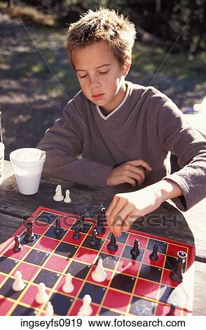 Little Boy Playing Chess View Large Photo Image Stock Photo - Little Boy Playing Chess. Fotosearch