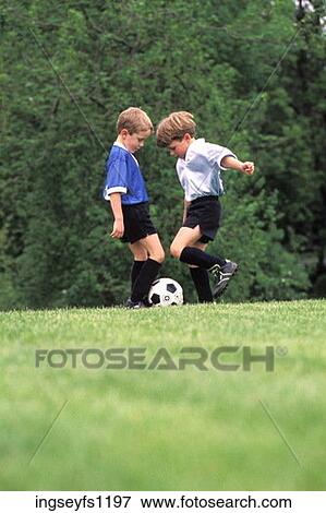 Little Boys Playing Soccer View Large Photo Image Stock Photo - Little Boys Playing Soccer. Fotosearch