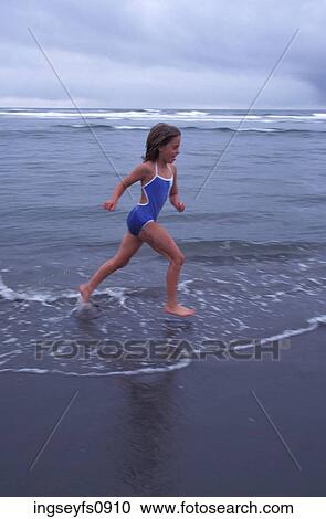 Little Girl Running on the Beach View Large Photo Image Stock Image - Little Girl Running on the Beach. Fotosearch