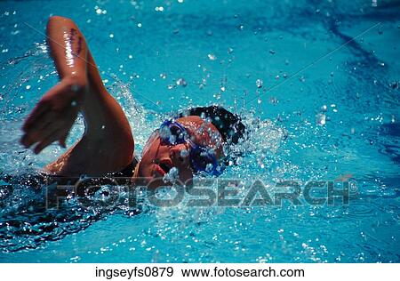 Stock Photo - Little Girl Swimming. Fotosearch