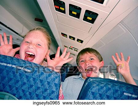 Little Kids Having Fun on an Airplane View Large Photo Image Stock Photography - Little Kids Having Fun on an Airplane. Fotosearch