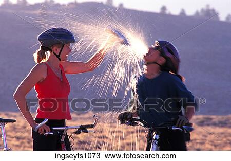 Man and Woman Biking and Playing Around View Large Photo Image Stock Image - Man and Woman Biking and Playing Around. Fotosearch