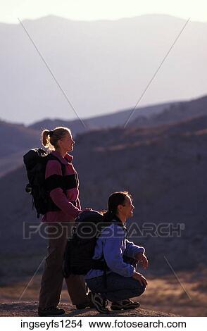Man and Woman Hiking Together View Large Photo Image Picture - Man and Woman Hiking Together. Fotosearch