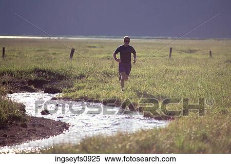 Man Jogging by Creek View Large Photo Image Stock Photography - Man Jogging by Creek. Fotosearch