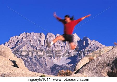 Man Jumping Over Rocks View Large Photo Image Stock Image - Man Jumping Over Rocks. Fotosearch