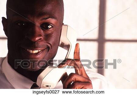 Man on Phone in Office View Large Photo Image Stock Photo - Man on Phone in Office. Fotosearch
