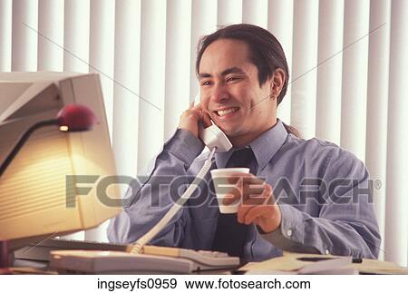 Man Working in Office on Phone View Large Photo Image Stock Photo - Man Working in Office on Phone. Fotosearch