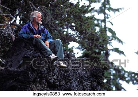 Older Man Sitting on a Rock View Large Photo Image Stock Image - Older Man Sitting on a Rock. Fotosearch