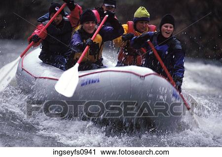 Stock Image - People White Water Rafting. Fotosearch