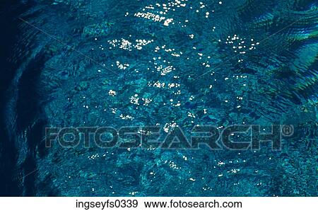 Stock Photo - Reflecting Ripples in Water. Fotosearch