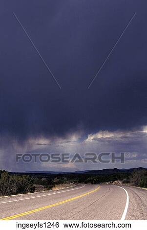 Rural Highway Under Storm Clouds View Large Photo Image Stock Photograph - Rural Highway Under Storm Clouds. Fotosearch