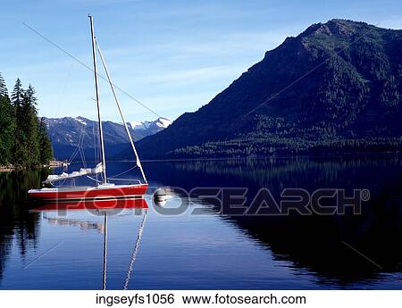 Sailboat on Clear Mountain Lake View Large Photo Image Stock Photograph - Sailboat on Clear Mountain Lake. Fotosearch