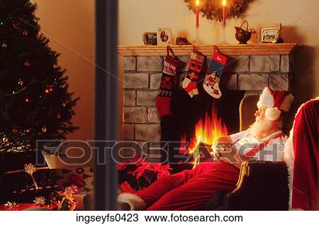Santa Asleep by the Fireplace View Large Photo Image Stock Image - Santa Asleep by the Fireplace. Fotosearch