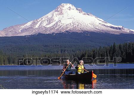 Senior Couple Canoeing Together View Large Photo Image Picture - Senior Couple Canoeing Together. Fotosearch