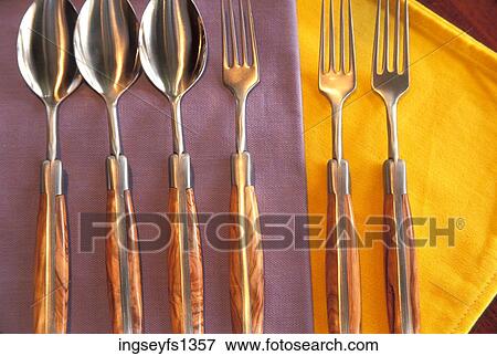 Silverware Laid Out On a Table View Large Photo Image Stock Photo - Silverware Laid Out On a Table. Fotosearch