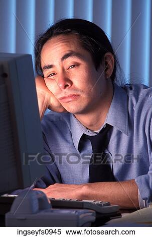 Sleepy Man Working Late at Office View Large Photo Image Stock Photography - Sleepy Man Working Late at Office. Fotosearch
