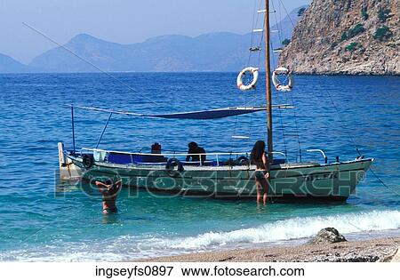 Small Boat Anchored on Pristine Beach View Large Photo Image Stock Photo - Small Boat Anchored on Pristine Beach. Fotosearch