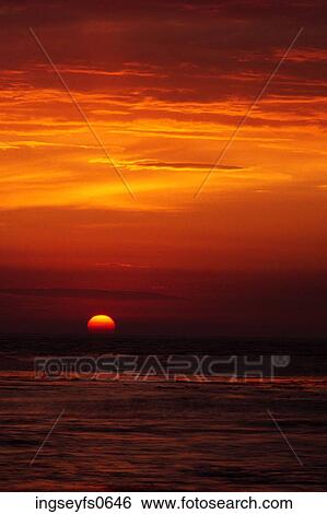 Sun Setting over the Ocean View Large Photo Image Stock Photograph - Sun Setting over the Ocean. Fotosearch