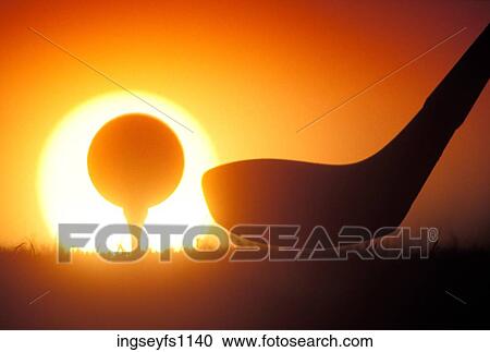 Stock Image - Teeing Up at Sunset. Fotosearch