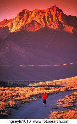 Woman Jogging in the Mountains View Large Photo Image Stock Photograph - Woman Jogging in the Mountains. Fotosearch
