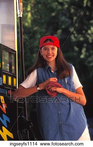 Woman Working at Gas Station View Large Photo Image Picture - Woman Working at Gas Station. Fotosearch