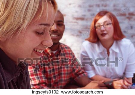 Young Executives in Meeting View Large Photo Image Stock Image - Young Executives in Meeting. Fotosearch