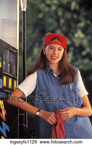 Young Girl Working at Gas Station View Large Photo Image Stock Photo - Young Girl Working at Gas Station. Fotosearch