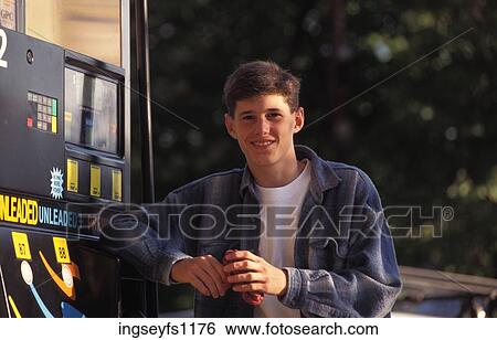 Young Man Working at Gas Station View Large Photo Image Stock Photograph - Young Man Working at Gas Station. Fotosearch