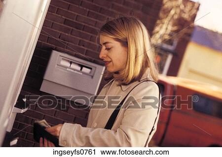 Young Woman Getting Money at ATM View Large Photo Image Stock Image - Young Woman Getting Money at ATM. Fotosearch