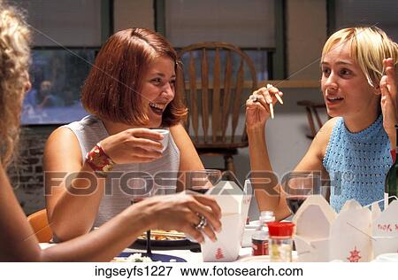 Young Women Having Dinner Party View Large Photo Image Stock Photo - Young Women Having Dinner Party. Fotosearch